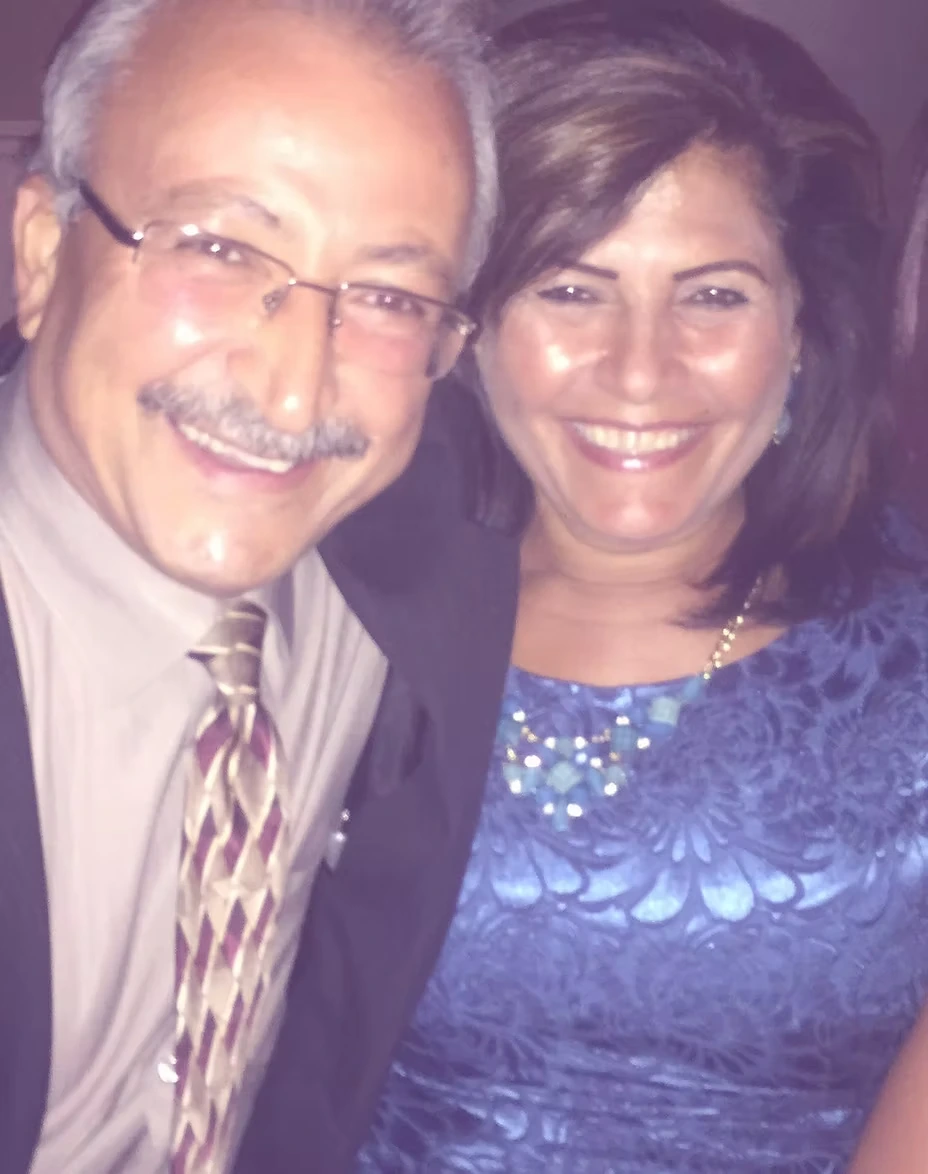 Christina’s mom and dad smiling together